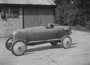 Andre Lombard in his Salmson single seater racing car, Brooklands, Surrey, 1922. Artist: Bill Brunell.