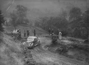 Ford V8 2-seater and dickey competing in the MCC Sporting Trial, 1935. Artist: Bill Brunell.