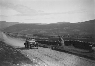 Charron-Laycock of T Shaw taking part in the Scottish Light Car Trial, 1922. Artist: Bill Brunell.