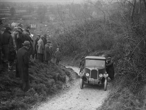Swift of JF Smeaton competing in the MCC Exeter Trial, Ibberton Hill, Dorset, 1930. Artist: Bill Brunell.