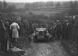 Morris Cowley of RJ Barker competing in the MCC Exeter Trial, Ibberton Hill, Dorset, 1930. Artist: Bill Brunell.