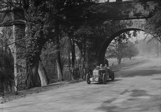 MG Midget of Eddie Hall at Starkey's Bridge, Donington Park, Leicestershire, 1933. Artist: Bill Brunell.