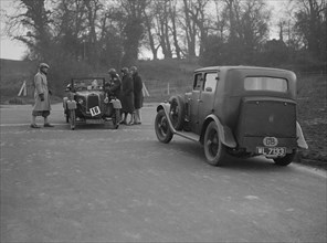 Talbot of EPH Jones and a MG 18/80 at the JCC Half-Day Trial, Ranmore Common, Surrey, 1930. Artist: Bill Brunell.