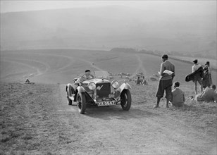 Alfa Romeo competing in the Brighton & Hove Motor Club Trial, 1920s. Artist: Bill Brunell.