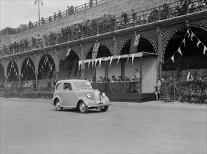 Standard Flying 8 of J Yates at the RAC Rally, Madeira Drive, Brighton, 1939. Artist: Bill Brunell.
