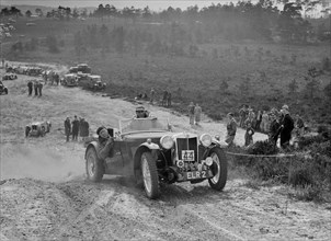 MG TA competing in the Great Weat Motor Club Trial, 1938. Artist: Bill Brunell.
