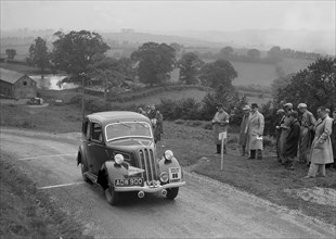 Ford Model C Ten of LL Morgan competing in the South Wales Auto Club Welsh Rally, 1937 Artist: Bill Brunell.