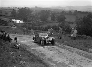Morgan 4/4 2-seater sports of GN Scott competing in the South Wales Auto Club Welsh Rally, 1937 Artist: Bill Brunell.