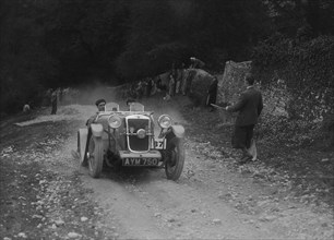 Hillman Aero Minx competing in a motoring trial, Nailsworth Ladder, Gloucestershire, 1930s.. Artist: Bill Brunell.