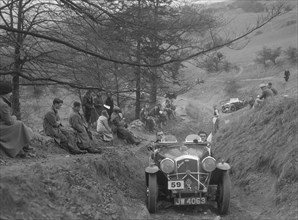 Wolseley Hornet of GK Crawford competing in the MG Car Club Abingdon Trial/Rally, 1939. Artist: Bill Brunell.