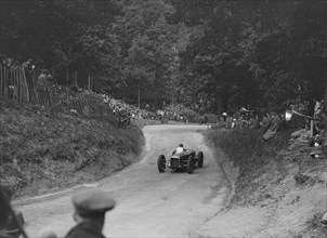 Delage of JC Davis competing in the MAC Shelsley Walsh Hill Climb, Worcestershire, 1932. Artist: Bill Brunell.