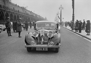 Jaguar SS of Elsie Wisdom at the RAC Rally, Brighton, Sussex, 1939. Artist: Bill Brunell.