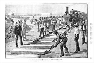 Laying sleepers and rails (permanent way) on the Transvaal Railway, South Africa, 1893. Artist: Unknown