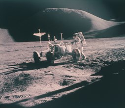 Apollo 15 astronaut James Irwin with the Lunar Rover, August 1971. Artist: Unknown