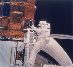 Astronaut on Shuttle mission 41-C, 1984. Artist: Unknown