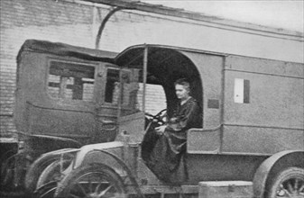 Marie Curie, Polish-born French physicist, driving a car converted into a radiological unit, 1914. Artist: Unknown