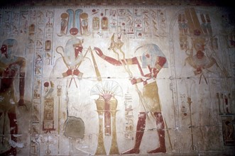 Painted relief of the Pharaoh before Thoth (Ibis-headed god), Temple of Sethos I, Egypt, c1280 BC. Artist: Unknown