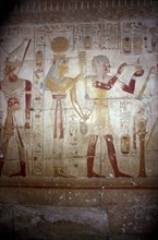 Painted relief of Sethos and Isis-Hathor, Temple of Sethos I, Abydos, Egypt, 19th Dynasty, c1280 BC. Artist: Unknown