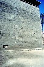 Reliefs of Pharaoh smiting enemies, The first Pylon, Temple of Khnum, Esna, Egypt. Artist: Unknown