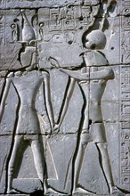 Relief of Amun-Ra giving life to Rameses II, Temple of Rameses II, Luxor, Egypt, c1250 BC. Artist: Unknown
