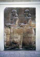 Assyrian relief of two servants, Palace of Sargon II, Khorsabad, c8th century BC. Artist: Unknown