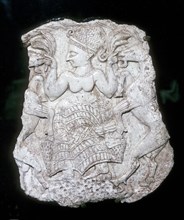 Ivory cosmetic box cover depicting a goddess feeding caprids, Tomb at Minet-el-Beida, c1250 BC. Artist: Unknown
