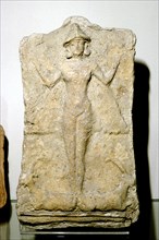 Terracotta relief of the goddess Astarte (Inanna) standing on two animals. Artist: Unknown