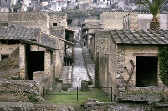 Roman huses of Herculaneum with the modern houses of Ercolano above, Italy. Artist: Unknown