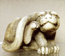 Netsuke carved in the form of a tiger, one of the 12 animals of the Japanese zodiac. Artist: Unknown