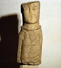 Celtic stone figure with torc and boar relief, Euffigneux, France. Artist: Unknown