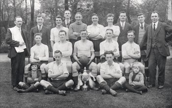 Rowntree football team pose with cup, 1929. Artist: Unknown