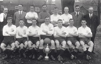 Rowntree football team pose with cup, 1936. Artist: Unknown