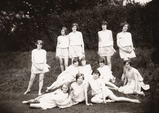Girls Greek dancing class pose on lawn, 1929. Artist: Unknown