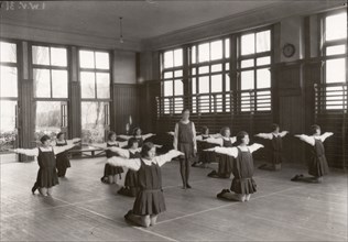 Rowntree girls in an indoor gymnastic class, 1930. Artist: Unknown