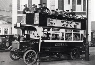 The Rowntree Brass Band on a motor bus in London, after 1904. Artist: Unknown