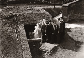 Rowntree employees queue to get into an Air Raid Shelter, York, Yorkshire, 1939. Artist: Unknown