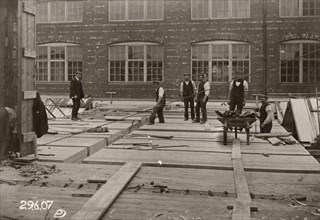 Builders at work, Rowntree factory, York, Yorkshire, 1907. Artist: Unknown