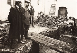 Building foremen examine work on site at Rowntree factory, Haxby Road,York, Yorkshire, 1908. Artist: Unknown