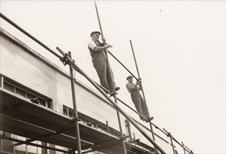 Scaffolders erecting scaffolding, 1951. Artist: Unknown