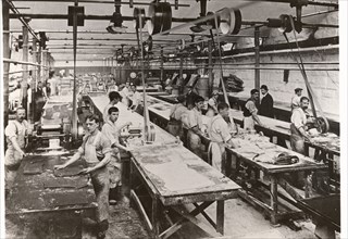 Men breaking toffee, Mackintosh Factory, Halifax, West Yorkshire, 1912. Artist: Unknown