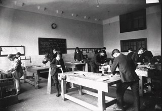 Boys woodwork class, Rowntree?s , York, Yorkshire, 1920. Artist: Unknown