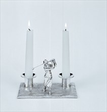 Silver candleholder with female golfer figure, 1930s. Artist: Unknown