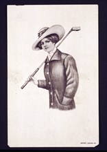 Postcard of woman holding golf club, c1900. Artist: Unknown