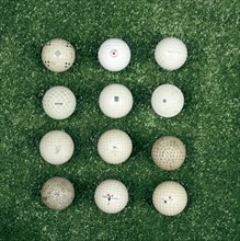 Variety of golf balls. Artist: Unknown