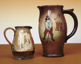 Royal Doulton pitchers with golfing theme, c1910. Artist: Unknown