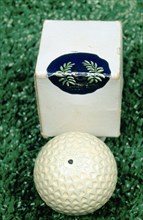 Golf ball and box, c1910. Artist: Unknown