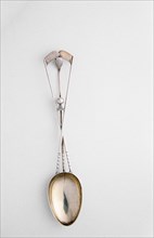 Silver spoon with crossed golf clubs and ball, c1920s. Artist: Unknown