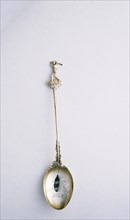 Silver spoon with golfer motif, British, c1910-c1930. Artist: Unknown