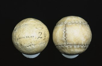 Original and reproduction of feathery golf balls, original c1830-c1840. Artist: William Gourlay