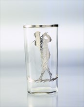 Drinking glass with silver overlay of golfer, United States, c1920. Artist: Unknown